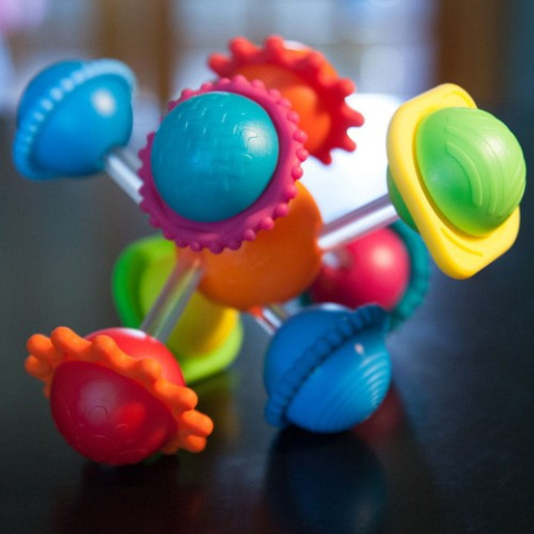 Fat Brain Toys Grzechotka Wimzle - Sensoryczna Przygoda
