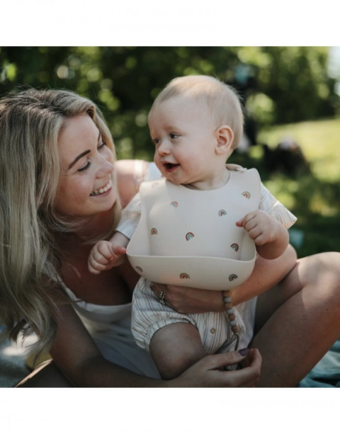 Mushie Śliniak Silikonowy z kieszonką Rainbows