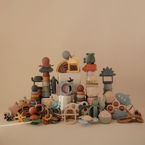 Mushie Silikonowy gryzak sensoryczny No-Drop Dino